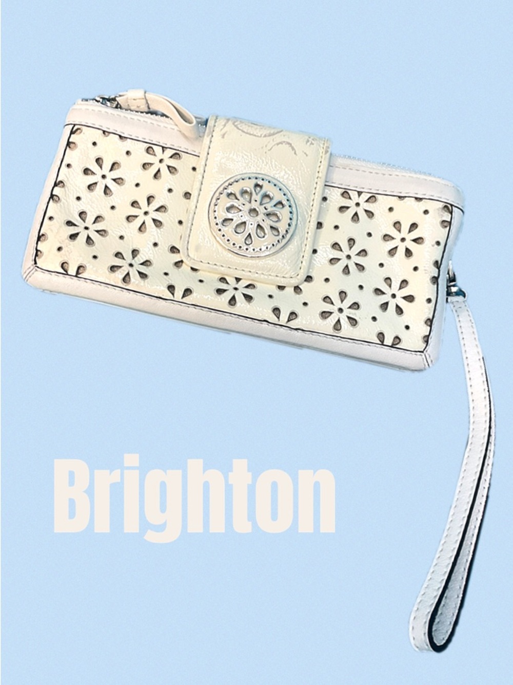 Brighton Ivory Floral Cutout Wristlet with Medallion